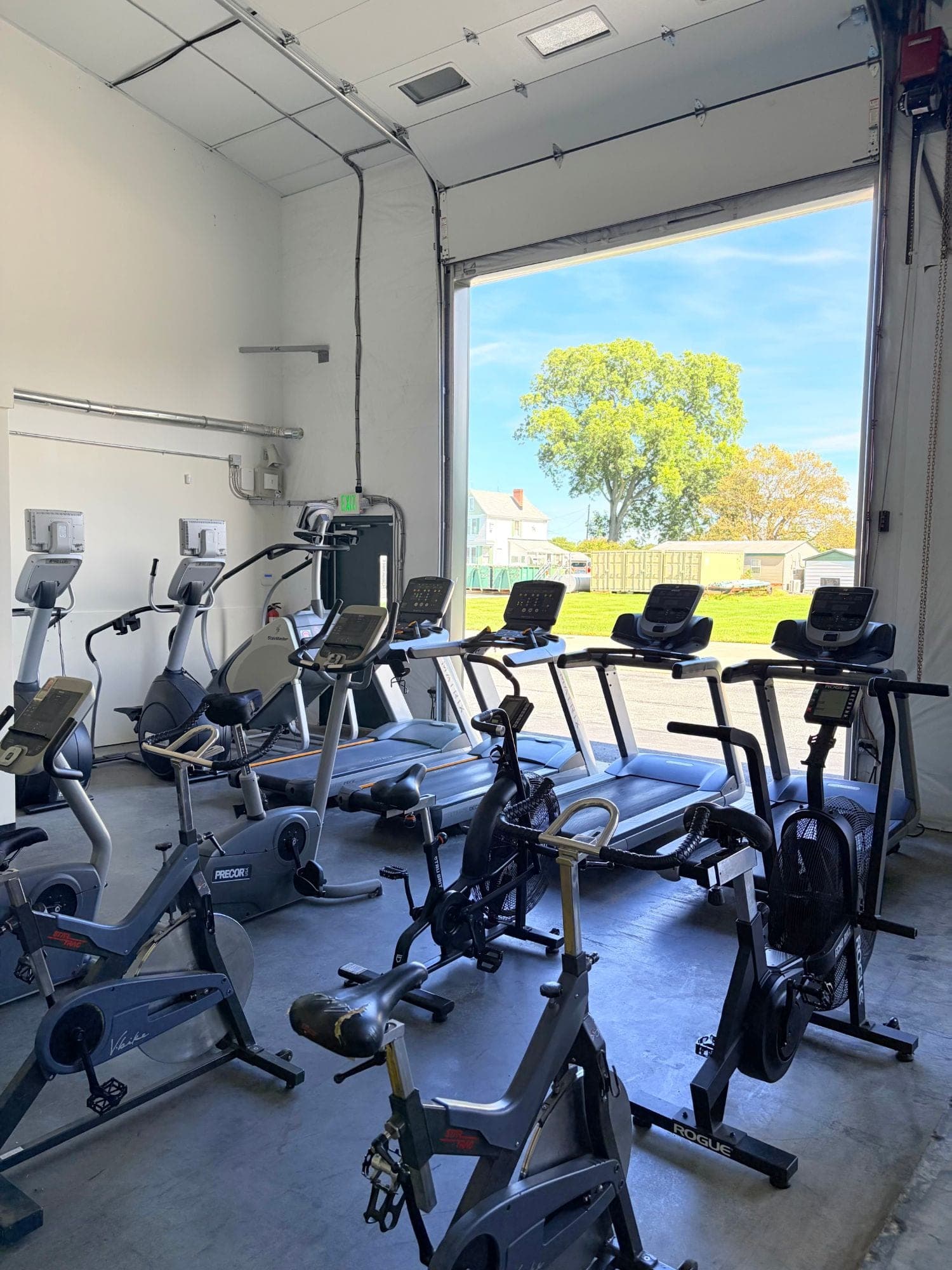 Cardio floor with Matrix treadmills, Rogue Echo bikes, spin bikes and a StairMaster